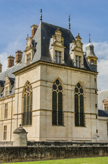 Obraz premium Architectural fragments of Cheteau Ecouen - historical chateau in city of Ecouen, north of Paris, France. Chateau built in 1538 – 1550.