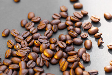 Brown roasted coffee beans seed on dark background
