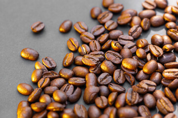 Brown roasted coffee beans seed on dark background