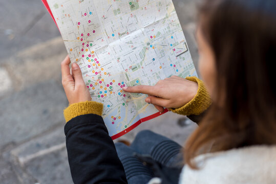 Woman pointing at map