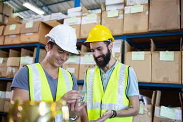 Warehouse worker check quality product before pack product for customer