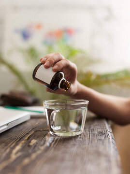 Woman taking medicine