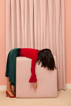stylish woman in a pink room