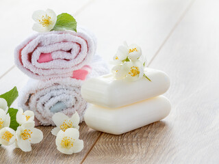 Obraz na płótnie Canvas Spa products and accessories with flowers of jasmine