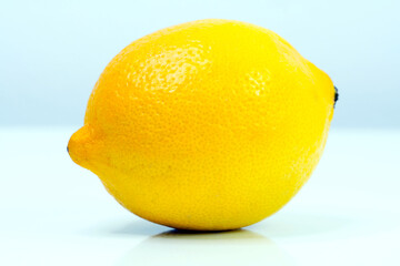 Lonely and juicy lemon with white background