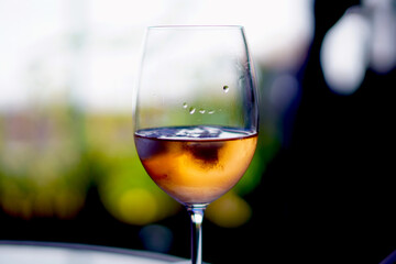 Rose wine glass with ice 