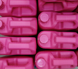 cans of red color with engine oil. the concept of changing the oil in the engine and refueling the...