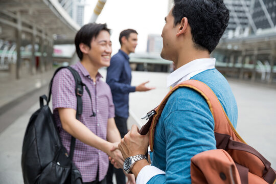 Two colleagues shaking hands