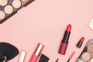 set of professional cosmetics, makeup tools and accessories on pink background, beauty, fashion,...