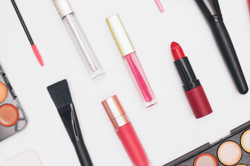 Obraz premium set of professional cosmetics, makeup tools and accessories isolated on white background, beauty, fashion, shopping concept, flat lay