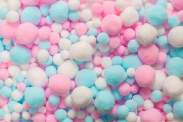 White, pink and blue soft pompons