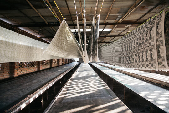 garment textiles hanging to dry after printing process jaipur india