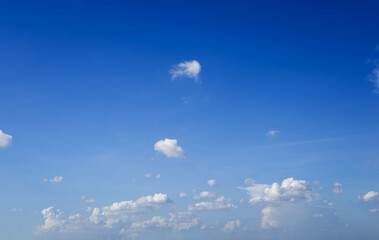 beautiful blue sky and white fluffy cloud horizon outdoor for background.