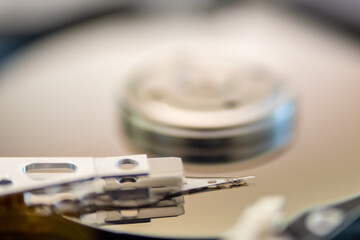 Fototapeta na wymiar internal moving parts and electronics of a typical disc hard drive