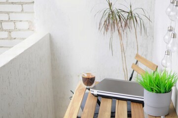 Remote working place. Home education. Breakfast at balcony.