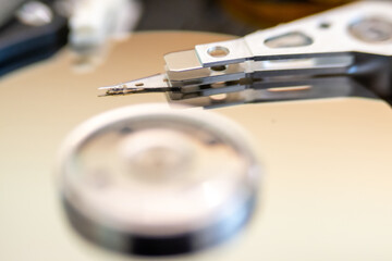 Fototapeta na wymiar internal moving parts and electronics of a typical disc hard drive