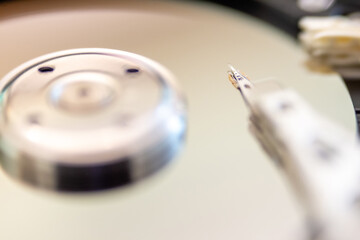 Fototapeta na wymiar internal moving parts and electronics of a typical disc hard drive
