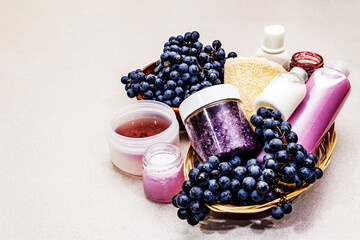 Natural spa accessories with ripe grapes