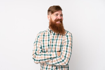 Fototapeta premium Redhead man with long beard over isolated white background happy and smiling