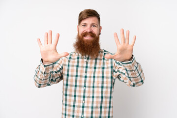 Redhead man with long beard over isolated white background counting ten with fingers