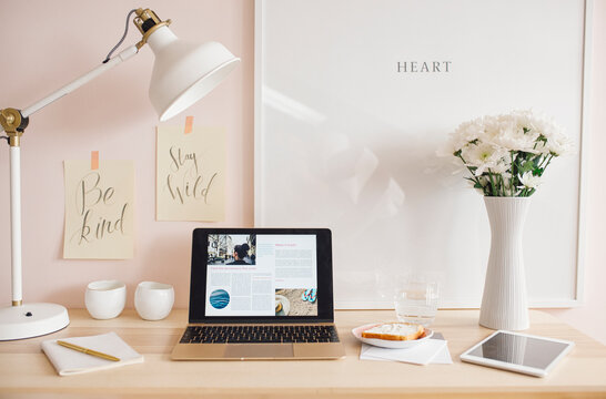 Laptop on A Woman's Desk