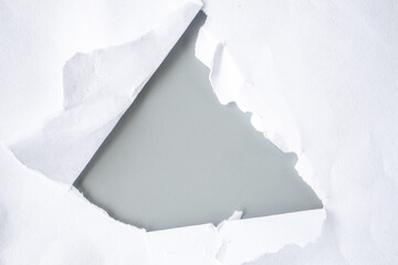 white torn paper on gray background. collection paper rip