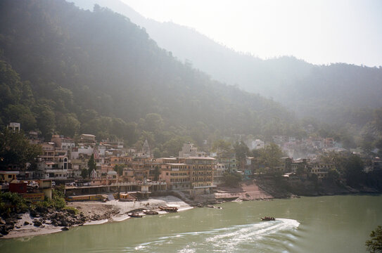 View of Rishikesh city along Ganges river bank india