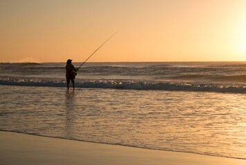 fisherman at sunset