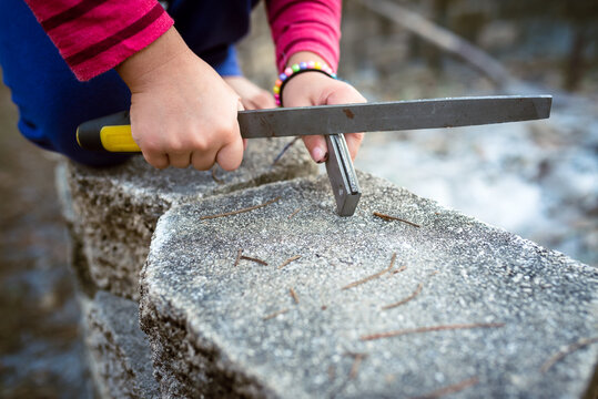 A Girl Learns To Start A Campfire