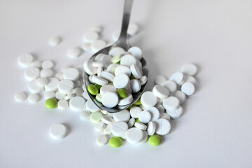 Tablets in a spoon