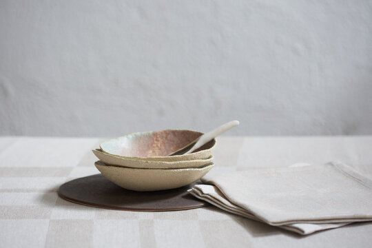Ceramic tableware with napkin and tablecloth