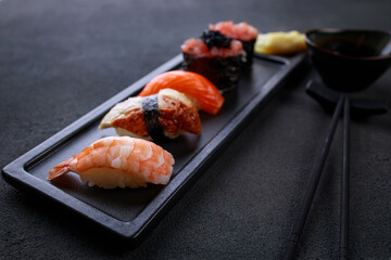 Fototapeta na wymiar gunkan and nigiri sushi set decorated with caviar