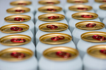 aluminum cans with carbonated water, energy drinks or beer. the view from the top