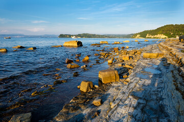 rocky sea shore in perfect evening light, slovenia, piran
