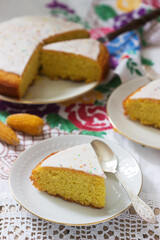 Traditional Romanian or Moldovan corn pie malay, with icing on a light background. Rustic style.