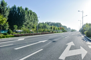 Asphalt roads and Bridges, sidewalks, and skylines against a backdrop of blue sky