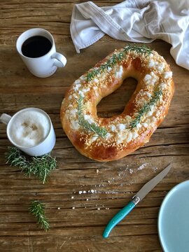 Roscon de reyes typical cake to eat the day of the three wise men in Spain with cups of coffee