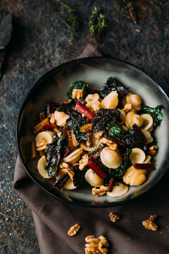Orecchiette with rainbow chard, walnuts and thyme