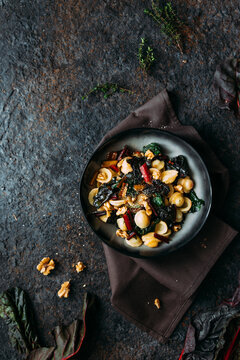 Orecchiette with rainbow chard, walnuts and thyme
