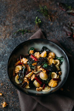 Orecchiette with rainbow chard, walnuts and thyme