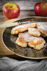 Homemade pancakes on a wooden table.
