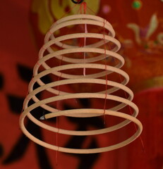 Chinese incense coil burning at a temple