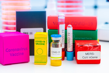 A set of medicines in medical lab for coronavirus NCOV- 19 from PCR test, antibody test, vaccine and remdesivir antiviral drug