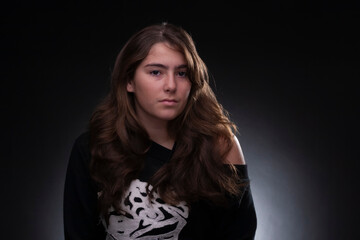 serious teenager, studio light, neutral background