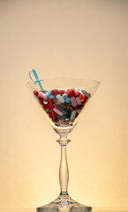 A collection of drugs in a cocktail glass concept