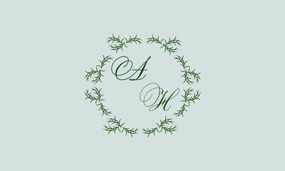 Decorative botanical logo with one or two letters (A, H). Elegant floral monogram for wedding, invitation, label, business.
