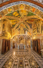 Fototapeta premium Subiaco, Italy - main sight of Subiaco and one of the most beautiful Benedictine monasteries in the World, the Sacro Speco Monastery displays amazing frescoes. Here in particular its interiors