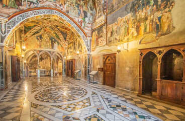 Obraz premium Subiaco, Italy - main sight of Subiaco and one of the most beautiful Benedictine monasteries in the World, the Sacro Speco Monastery displays amazing frescoes. Here in particular its interiors