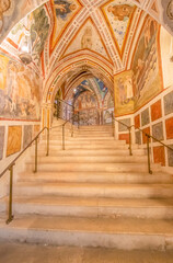 Fototapeta premium Subiaco, Italy - main sight of Subiaco and one of the most beautiful Benedictine monasteries in the World, the Sacro Speco Monastery displays amazing frescoes. Here in particular its interiors