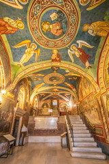 Fototapeta premium Subiaco, Italy - main sight of Subiaco and one of the most beautiful Benedictine monasteries in the World, the Sacro Speco Monastery displays amazing frescoes. Here in particular its interiors